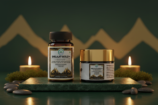 Shilajit Gold+ capsule bottle and resin jar by 5 Rivers Nutrition on a dark forest green stone surface with gold accent lighting and Himalayan mountain silhouettes in the background
