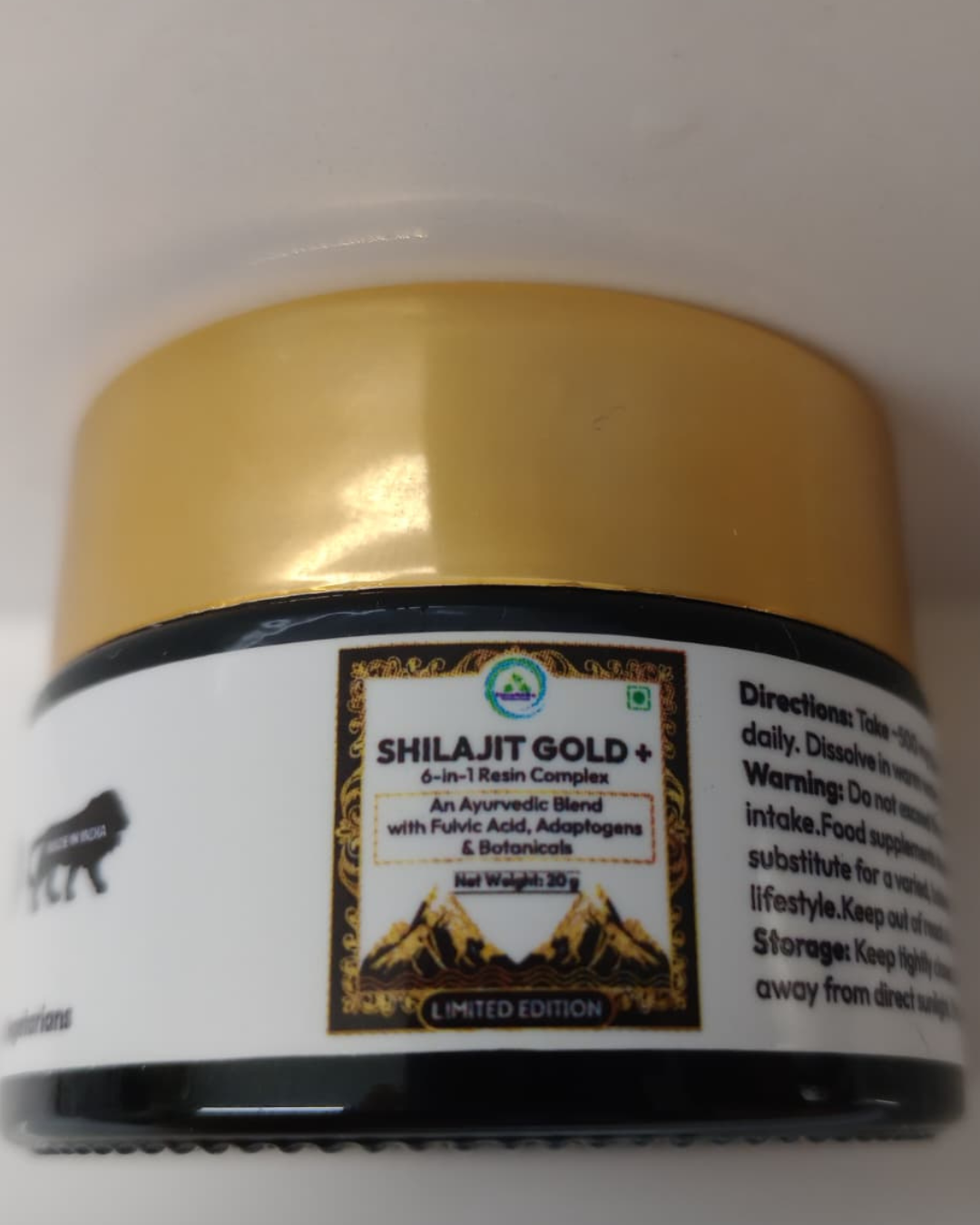 Jar of Shilajit Gold+ resin complex with gold lid and white label featuring "6-in-1 resin complex" text, an Ayurvedic blend of fulvic acid, adaptogens and botanicals.