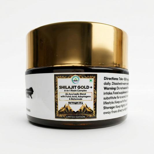 A jar of Shilajit Gold + 6-in-1 Resin Complex, featuring a shiny metallic gold lid and a white label with black text and a central gold-bordered mountain graphic.